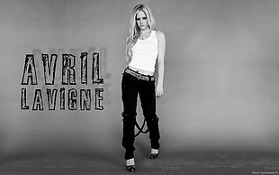 grayscale photography of Avril Lavigne with her name beside her
