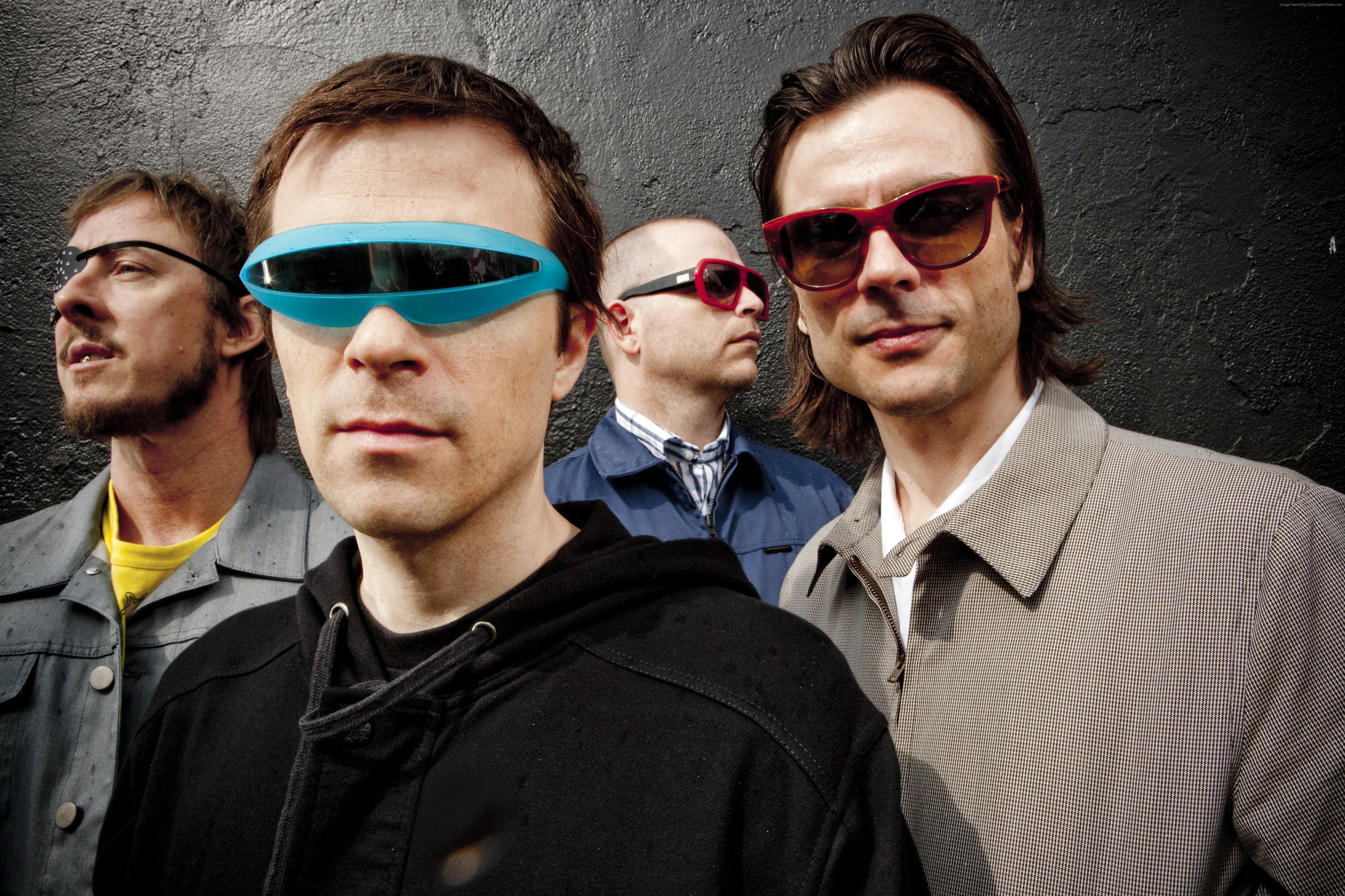 four men with sunglasses
