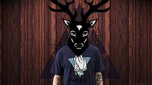 person wearing blue and white crew-neck T-shirt with reindeer head