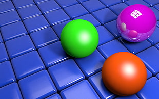 three Multicolored balls HD wallpaper