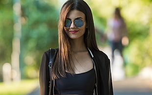 woman wearing black jacket and black sunglasses during daytime HD wallpaper