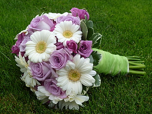 white and purple petaled flower bouquet