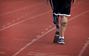 men's black artificial running legs, legs, tattoo, prosthesis, men