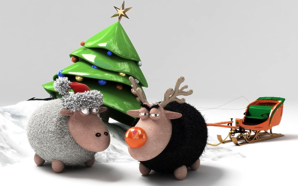 two black and gray deer and sheep figurines on white surface HD wallpaper