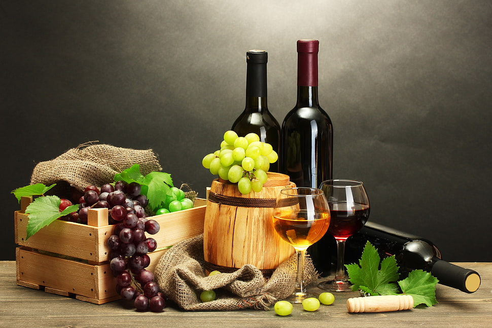 bunch of grape fruits beside wine bottle and glasses HD wallpaper