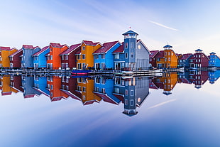 blue house near body of water, reflection, house, building