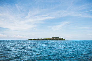island at middle on the sea