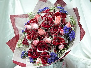 bouquet of red, pink, and purple petaled flower \