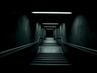 black and gray metal frame, stairs, lights, dark