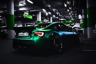green coupe on parking area HD wallpaper