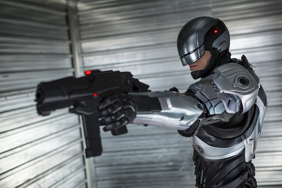 Robocop holds gun HD wallpaper