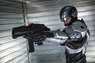 Robocop holds gun HD wallpaper