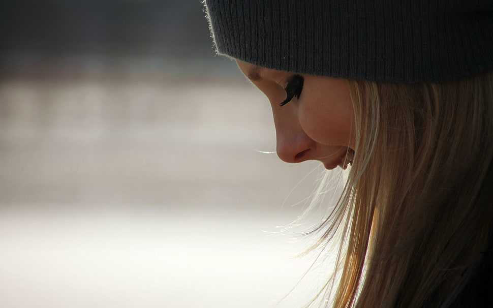 selective focus photography of woman wearing black knit hat HD wallpaper