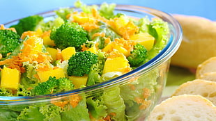 vegetable salad in clear glass bowl
