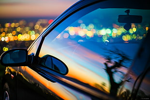 photography of sunset on car window