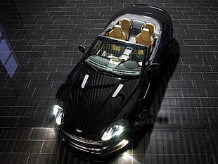 aerial photo of black convertible coupe