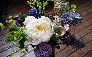 white Peony flower with Grape Hyacinth and blue cluster flower bouquet