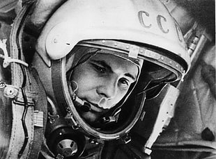 grayscale photo of pilot with helmet