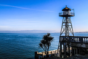 watch tower along side sea dock, alcatraz lighthouse