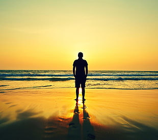 silhouette photo of man on seashore, nature