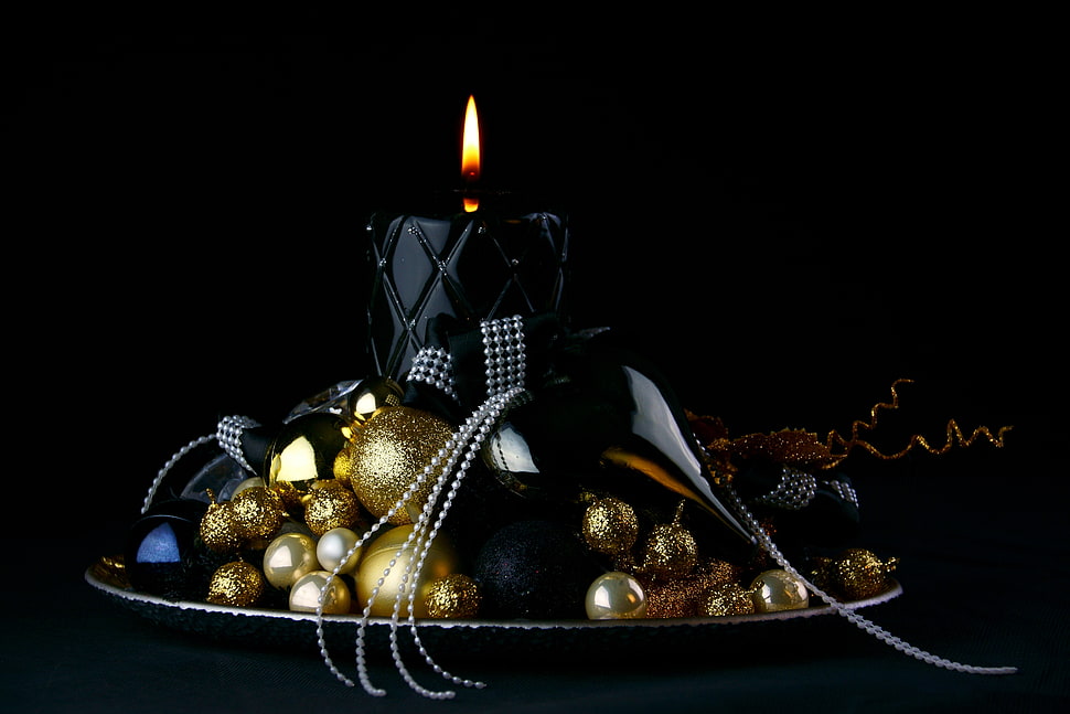 gold baubles and black pillar candle HD wallpaper