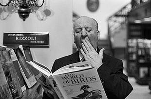 man yawning while reading a book, men, Film directors, Alfred Hitchcock, monochrome
