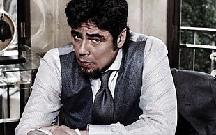 man in white dress shirt with black vest sitting inside house HD wallpaper