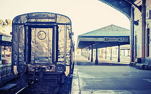 silver train on rail