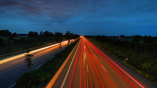 time lapsed photo of expressway during sunset photo HD wallpaper