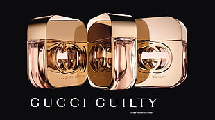 three Gucci Guilty fragrance bottles
