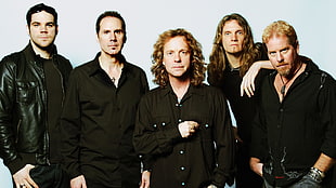 men wearing black dress shirts
