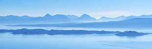panorama view of mountains with body of water HD wallpaper