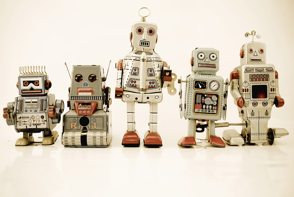 five assorted type of robot toys wallpaper HD wallpaper