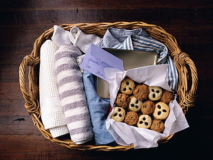 cookie in box and shirts in woven basket