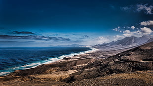 photo of brown mountain, nature, landscape, beach, sea HD wallpaper
