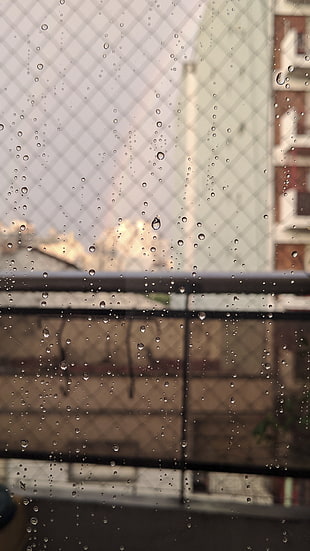 clear glass window, rain, water drops, rainbows