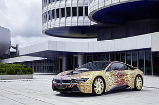 yellow and red BMW sports car