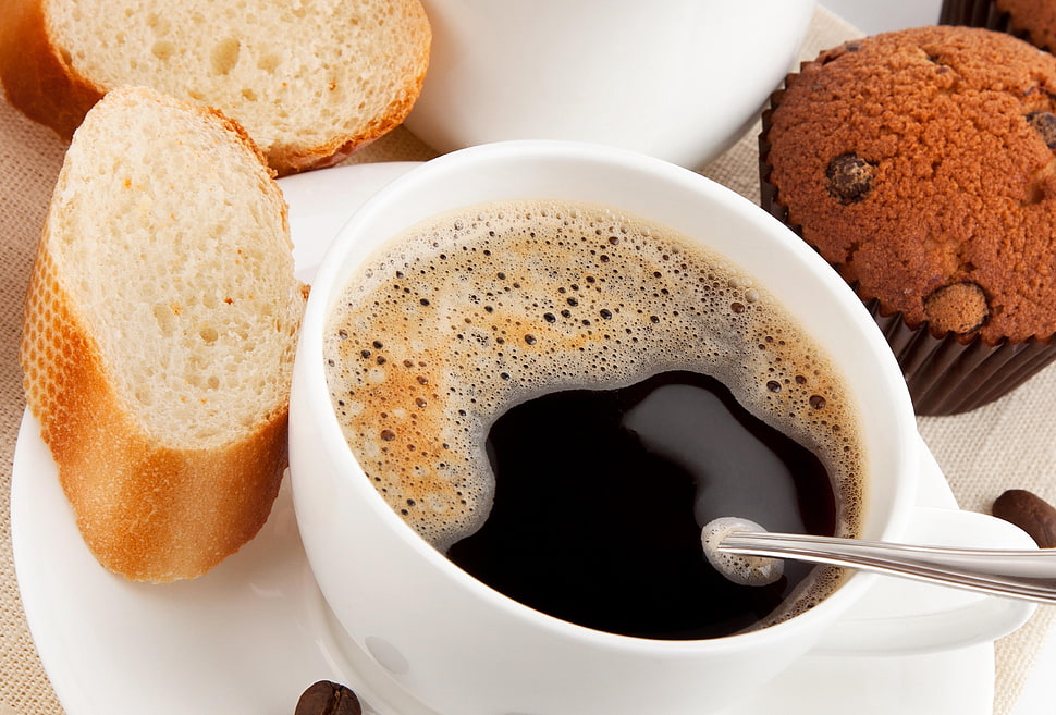 coffee on white ceramic mug beside brown bread HD wallpaper