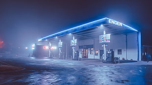 white and blue Engen gas station, night, long exposure, street, street light