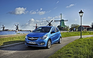 blue Opel 5-door hatchback