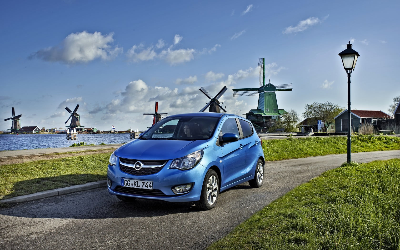 blue Opel 5-door hatchback