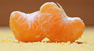 two orange fruit slices
