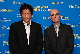 man wearing black suit jacket beside man wearing eyeglasses standing in New York Film Festival wallpaper HD wallpaper
