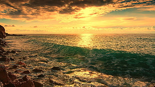 body of water, beach, sea, sunlight, clouds