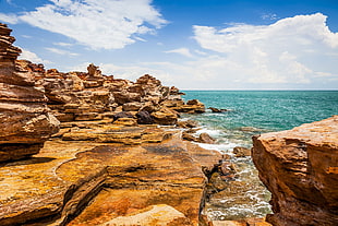 rocks near body of water, water