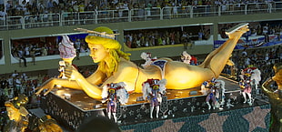 woman wearing bikini yellow statue