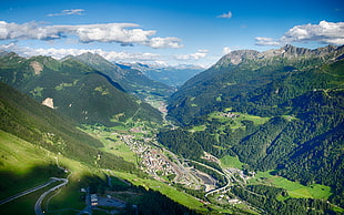 aerial photo of mountains and town