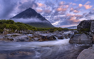 landscape photography of mountain and river during day time