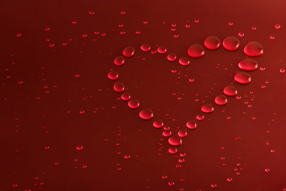 red heart-shape droplets photo HD wallpaper