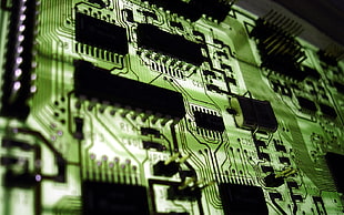macro photograph of green circuit board